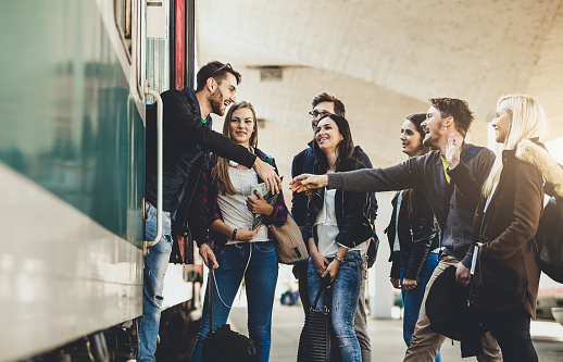 Teenagers on the railway station