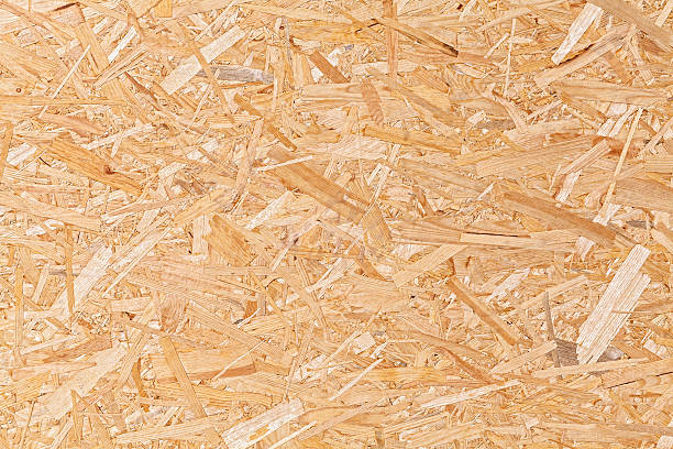 orientée strand à repasser, fiberboard fond de texture. - wood chipboard photos et images de collection