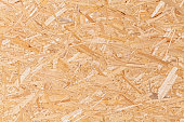 Oriented strand board, fiberboard background of texture.