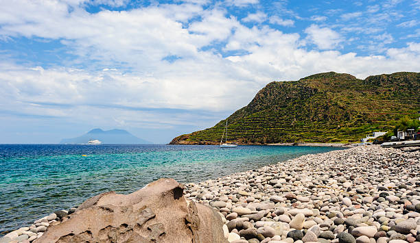 Amazing view of Filicudi island seashore. Filicudi island pebble beach, Aeolian Islands, Italy. filicudi stock pictures, royalty-free photos & images