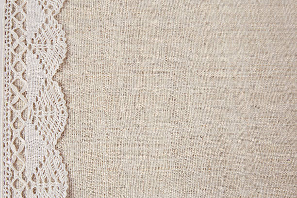 istock Lace on linen copy space background, vintage tone 496264296