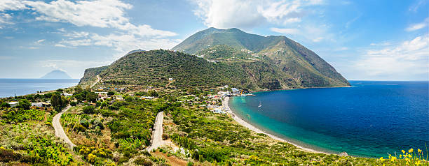Stunning view of Filicudi island two shores. Filicudi island panorama with Alicudi on the background, Aeolian islands, Italy. filicudi stock pictures, royalty-free photos & images