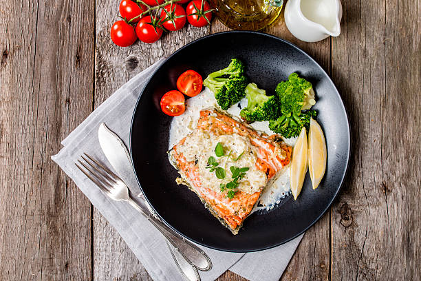 istock Grilled Salmon Steak with Cream sauce 496265504