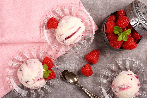 istock Homemade berry ice cream decorated with fresh raspberries 496265727