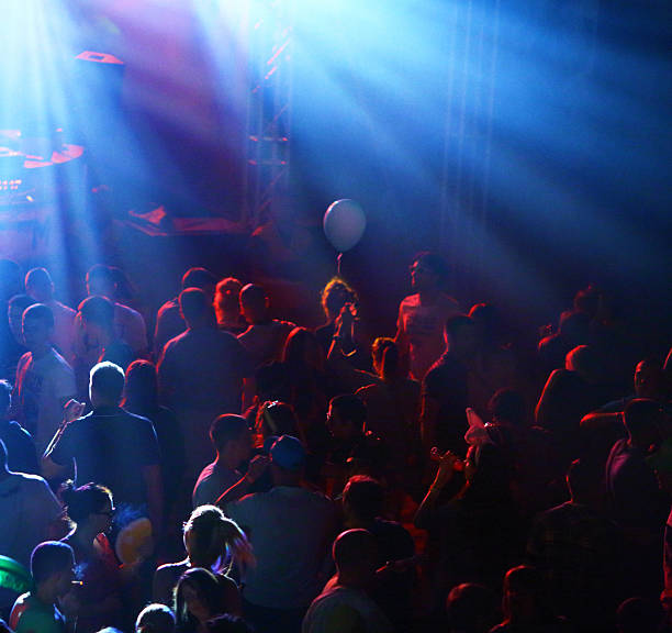 istock Group of people  dancing at concert. 496265943
