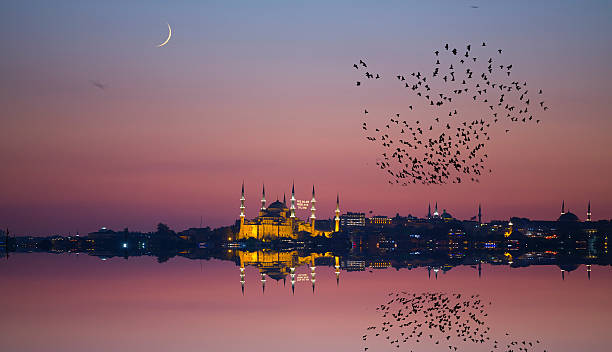 ночь и istanbul - looking through window individuality old architecture стоковые фото и изображения