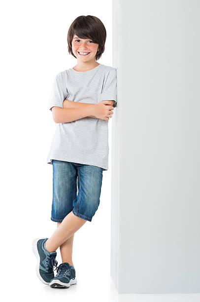 Happy boy against blank sign