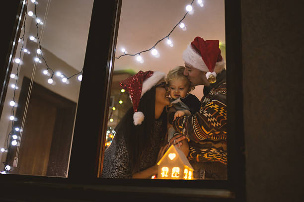 istock Young family enjoy in Christmas night 496282504