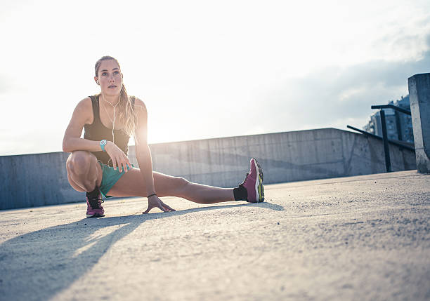 istock Exercising woman outdoors 496285072