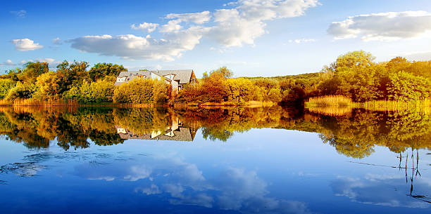 istock House in autumn forest 496285318