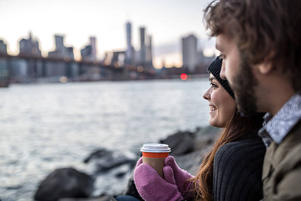 istock Young Couple Enjoying Sunset at Brooklyn Bridge, NYC 496288680