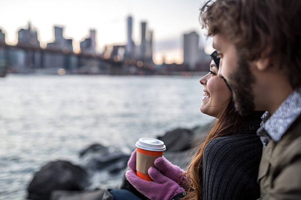 istock Young Couple Enjoying Sunset at Brooklyn Bridge, NYC 496288716