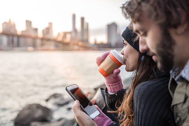 istock Young Couple Enjoying Sunset at Brooklyn Bridge, NYC 496288830
