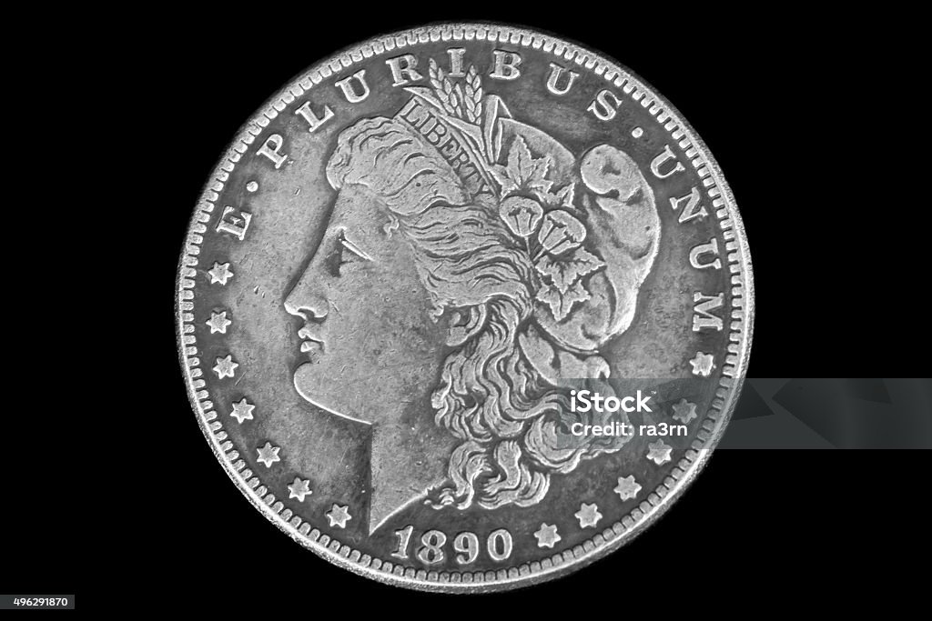 Obverse 1 US dollar in 1890 The obverse depicts the head of Liberty wearing a Phrygian cap with a crown, a tiara and a circular wreath of twigs of cotton and wheat ears. 1890 Stock Photo