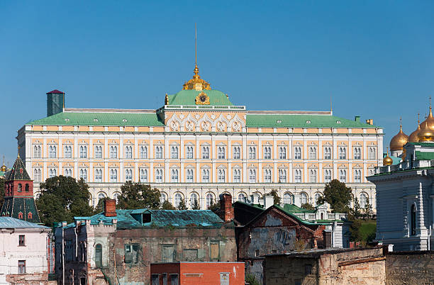 Grand Kremlin Palace on the background of old ruined houses stock photo