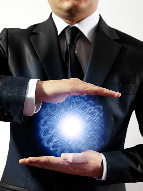 Businessman Holding Plasma Ball