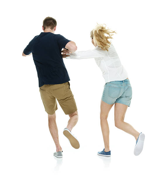 istock Rear view of couple playing around 496304017