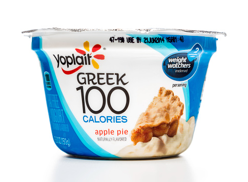 Miami, USA - May 15, 2014: Yoplait Greek 100 calories Apple Pie yogurt jar