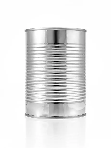 Photo of Metal can for preserved food on white background.