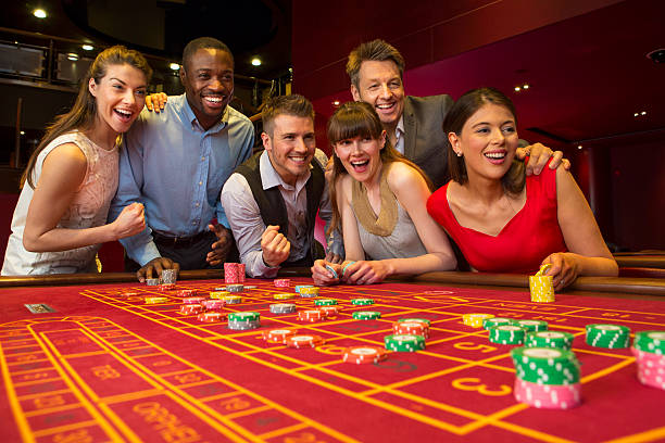 590+ Group Of Young People Playing Roulette Stock Photos, Pictures &  Royalty-Free Images - iStock