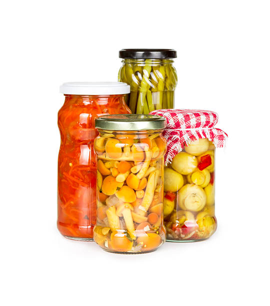 istock Canned vegetables in glass jars 496306783