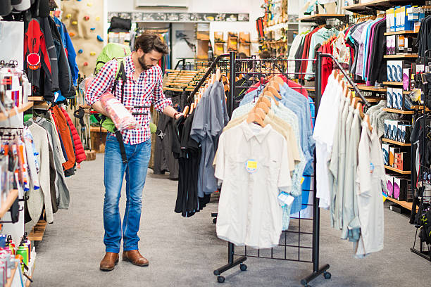 istock Man buying sports equipment 496308429