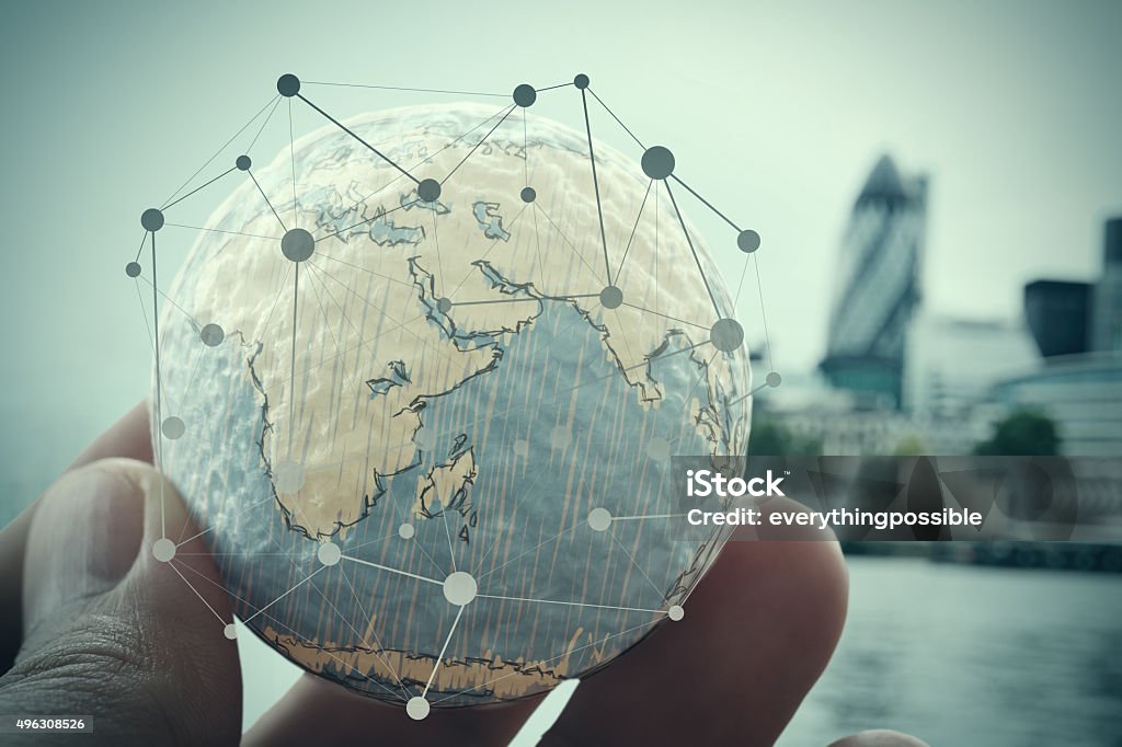 close up of businessman hand showing texture close up of businessman hand showing texture the world with digital social media network diagram concept Elements of this image furnished by NASA london city background 2015 Stock Photo