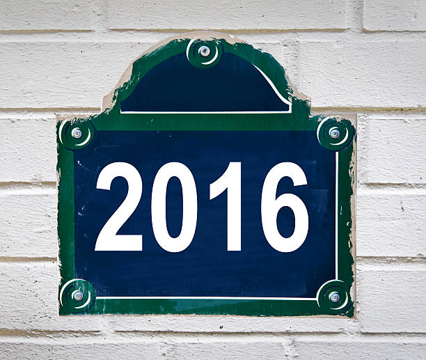 istock 2016 written on a Paris street plate on a wall 496308808