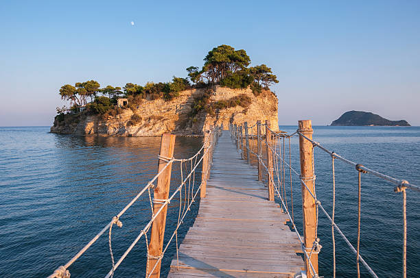 istock Bridge to Cameo Island at sunset, Zakynthos, Greece 496311142