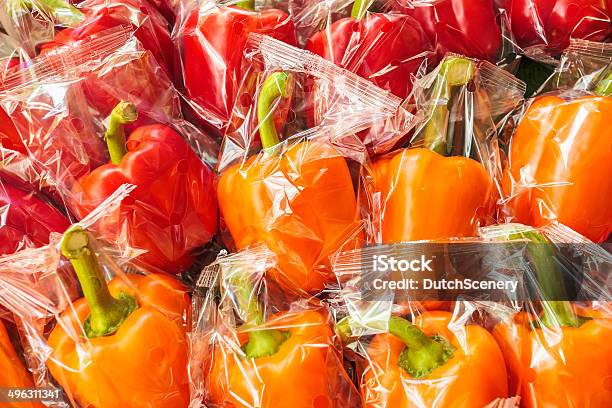 Bunch Of Plastic Wrapped Bell Peppers Stock Photo - Download Image Now - Plastic, Packaging, Vegetable