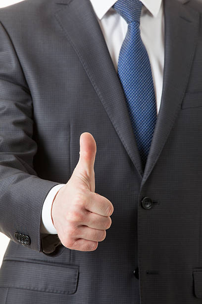 istock Businesman showing thumd up sign 496312614
