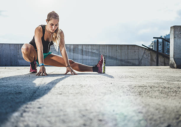 istock Exercising woman outdoors 496314090