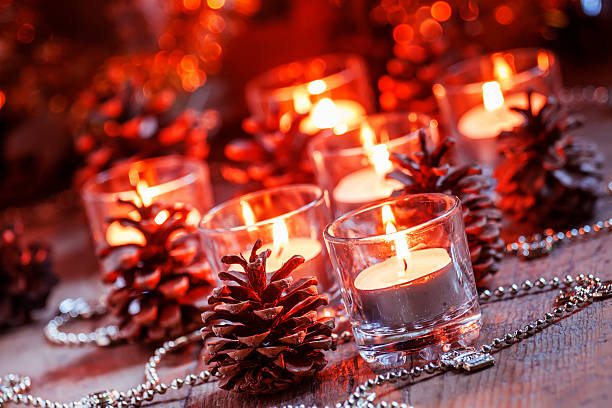 istock Christmas and New Year's background with candles 496318554
