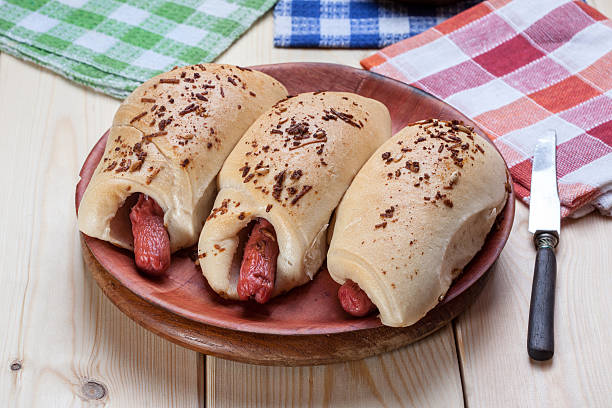istock Sausage baked in dough. 496319810