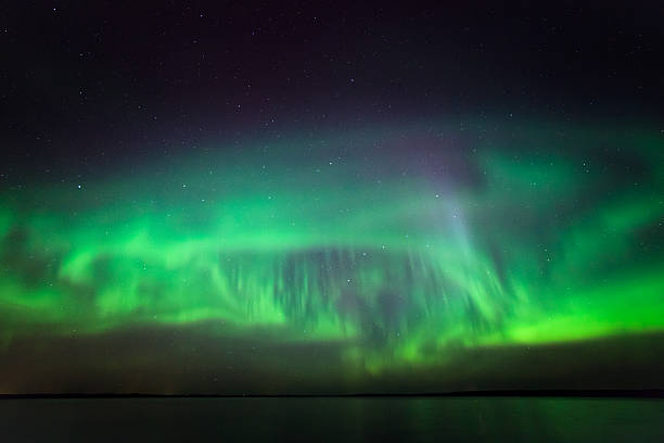 istock Northern lights over lake in finland 496322574