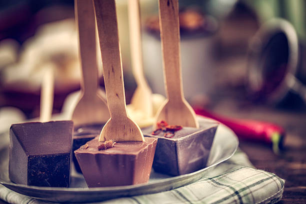 Hot chocolate with spoon with a red background