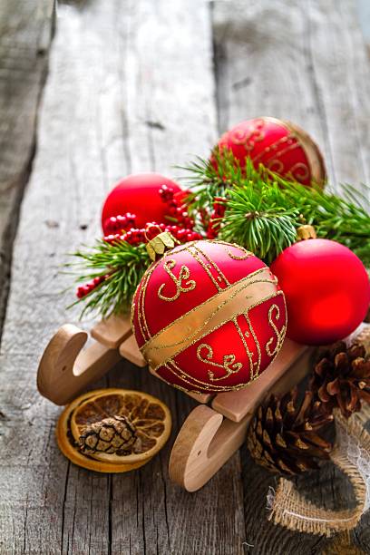 istock Colorful christmas decorations on rustic wood background 496347598