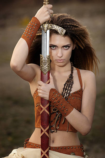 istock The beautiful girl with a sword. 496347600