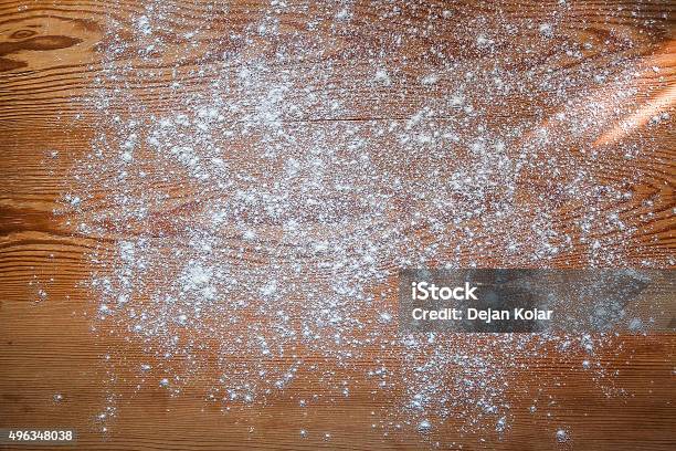 White Flour Scattered On Rustic Wooden Board Baking Background Stock Photo - Download Image Now