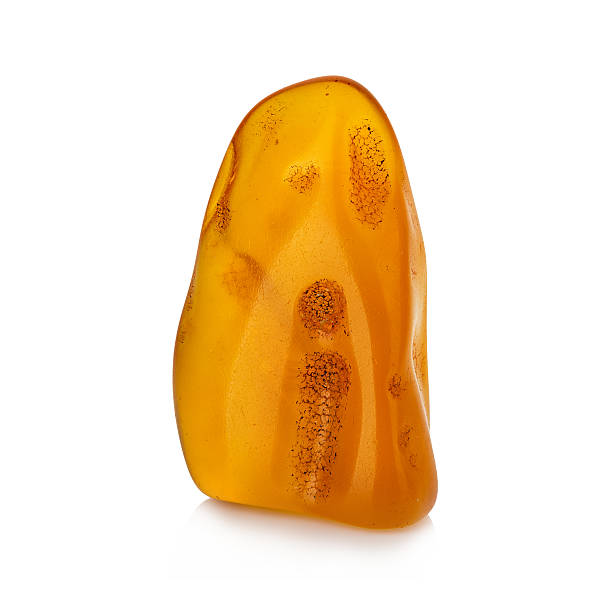 istock Piece of amber isolated on white background 496349444