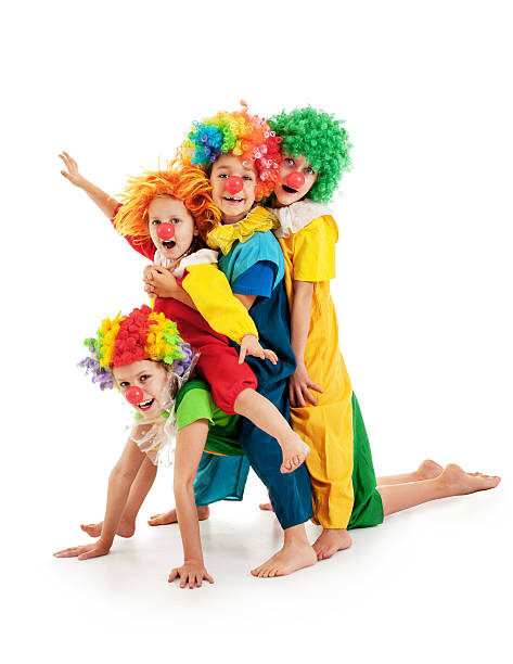 joyful kid with clown on birthday party