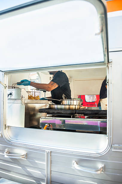 istock Food truck kitchen seen through window 496350204