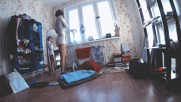 istock woman in her room 496350230