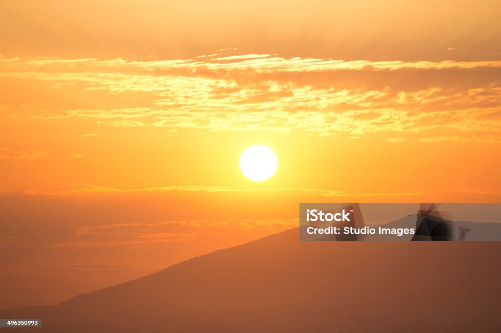 Sun rising Sun rising with the mountain silhouette Abstract Stock Photo