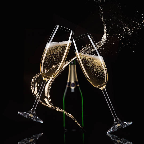 istock Glasses of champagne with splash 496351670