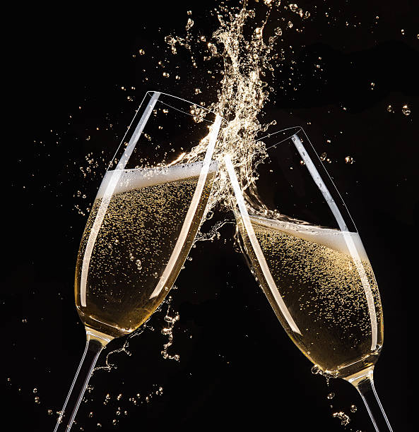 istock Glasses of champagne with splash 496351688
