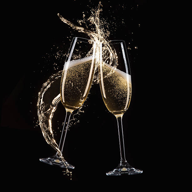 istock Glasses of champagne with splash 496351746