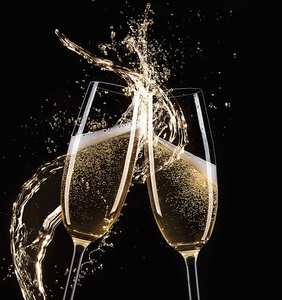 istock Glasses of champagne with splash 496351778