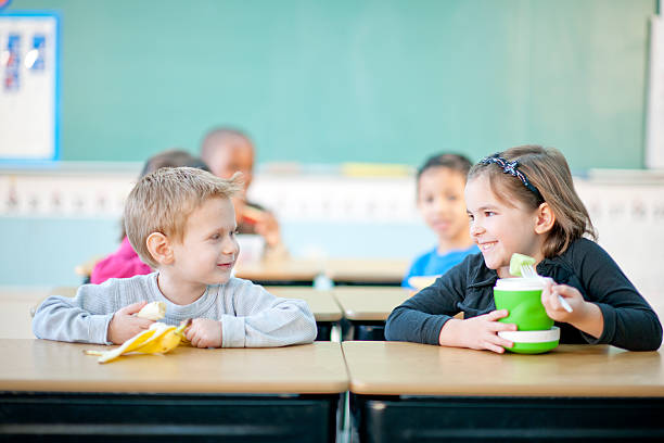 istock Children Eating Snacks at School 496352258
