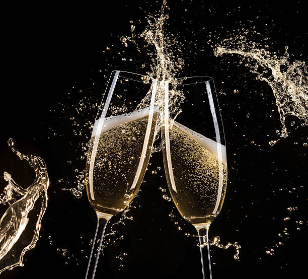 istock Glasses of champagne with splash 496352294
